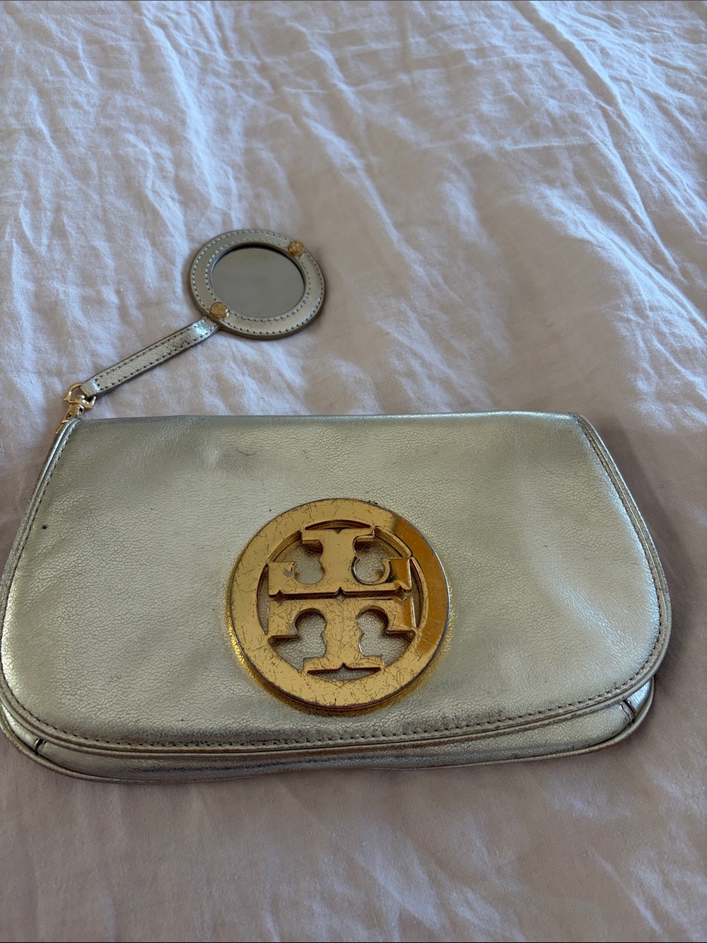 Tory Burch gold clutch circa 2011